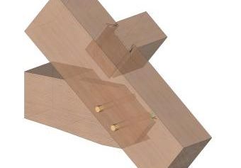 This image shows one way collar ties can be connected to rafters using a traditional mortise and tenon and hardwood pegs. A dovetailed purlin is also shown.