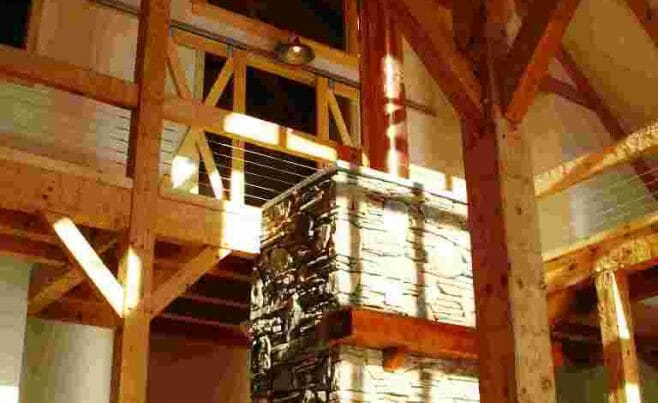 Great Stone Fireplace with Hand Hewn Timbers