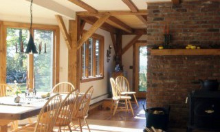 Interior View of Antique Brick, Mantel and Maple Beams