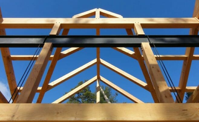 Steel reinforced timber bent