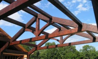 Modified King Post Truss with raised timber tie beam