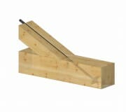 Hidden steel tension rod in heavy timber