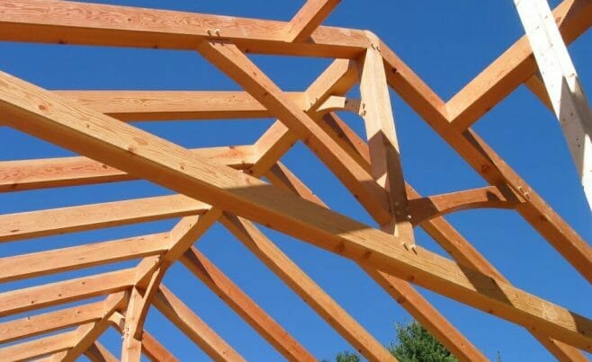 King post truss with arched webs and curved knee braces