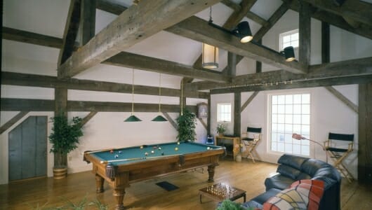 Timber Frame game room with Reclaimed wood beams