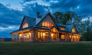 Exterior of Timber Frame Home Night Pasture Farm in Chelsea, VT.
