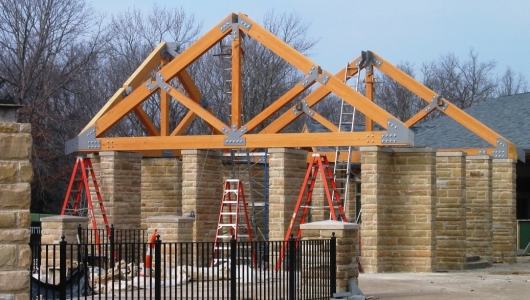 Pavillion with King Post Trusses and Steel Gusset Plate Joinery for National Park.