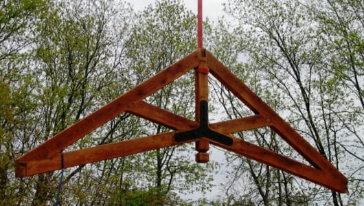 Heavy Timber Oak Scissor Truss being Raised By Crane