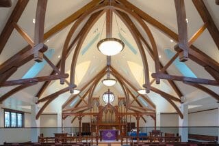 Interior of Saint Andrew's Church with Glulam Arched Trusses in Ridgefield, CT