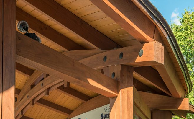 A detail photo of timber arches and purlins