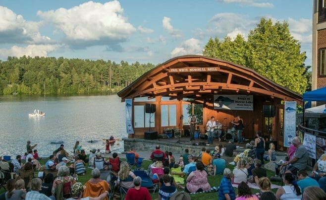 Timber framed band shell being enjoyed by the public