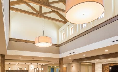 The King Post Trusses in the Christina Seix Academy in Trenton, NJ were made with Kiln-dried Douglas fir. The King Post Trusses highlight the cathedral ceiling and tall stone fireplace.