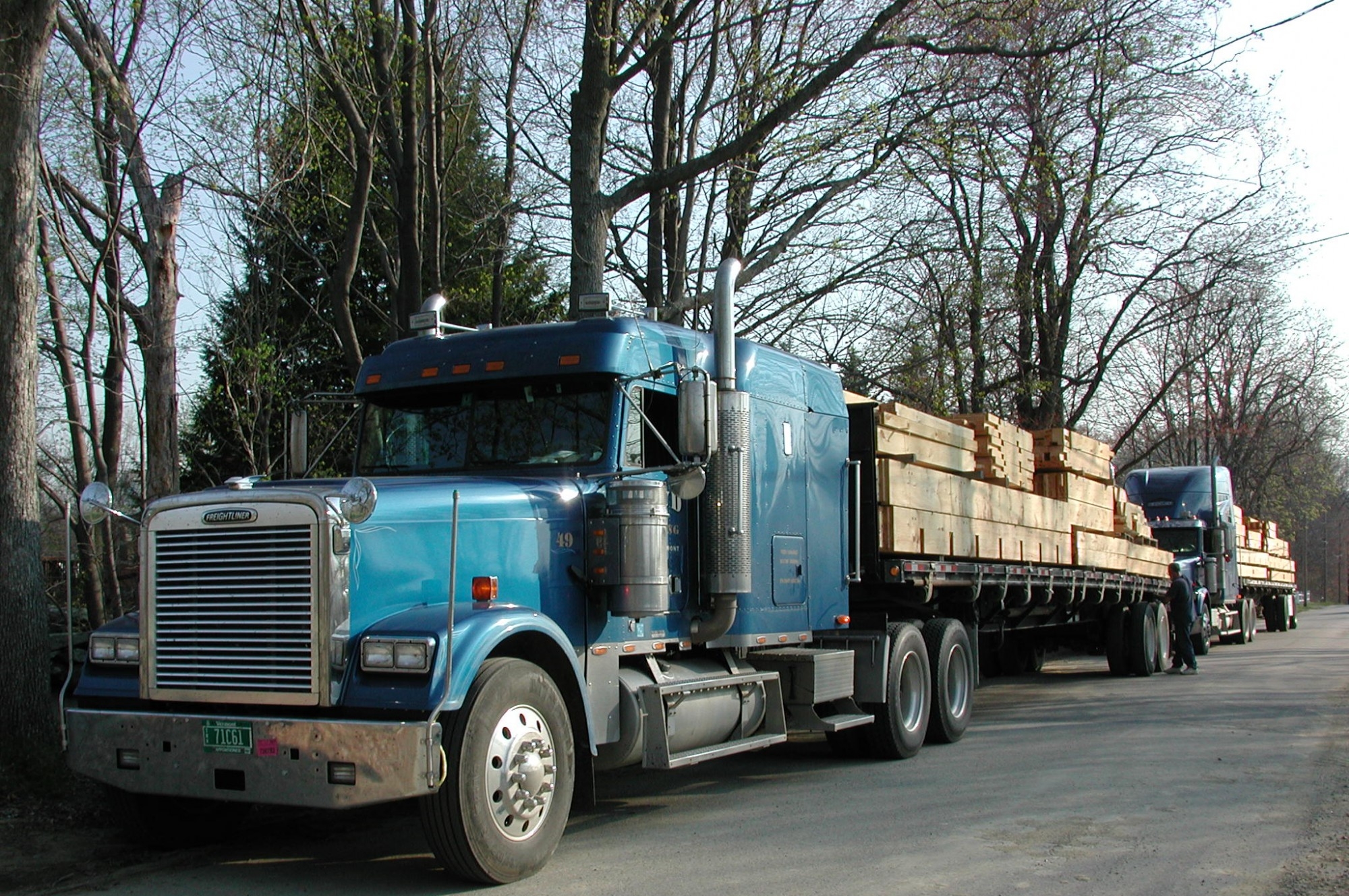 Timber frame beams loaded on a truck for delivery