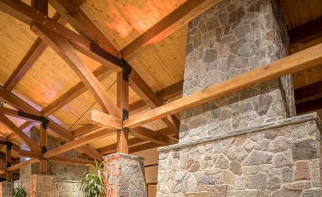 Timber frame and stone pillar