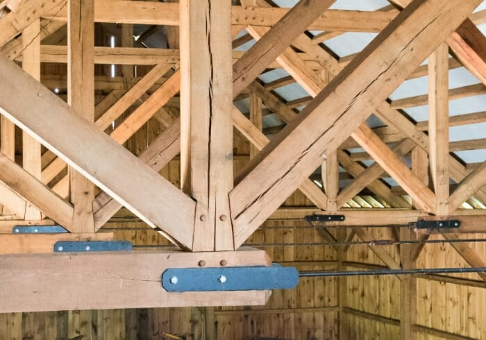 Wood and steel joinery in a timber frame