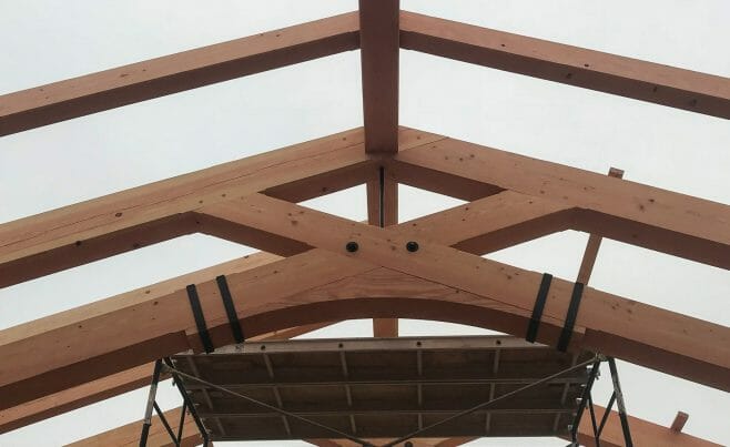 Heavy Timber Truss with Custom Arches and Steel Bands