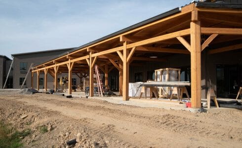 Timber framed exterior seating area for the Bechtel Summit Dining Hall - Under Construction