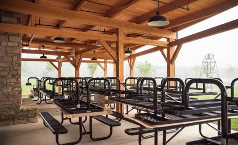 Timber framed dining pavilion with exposed wood beams