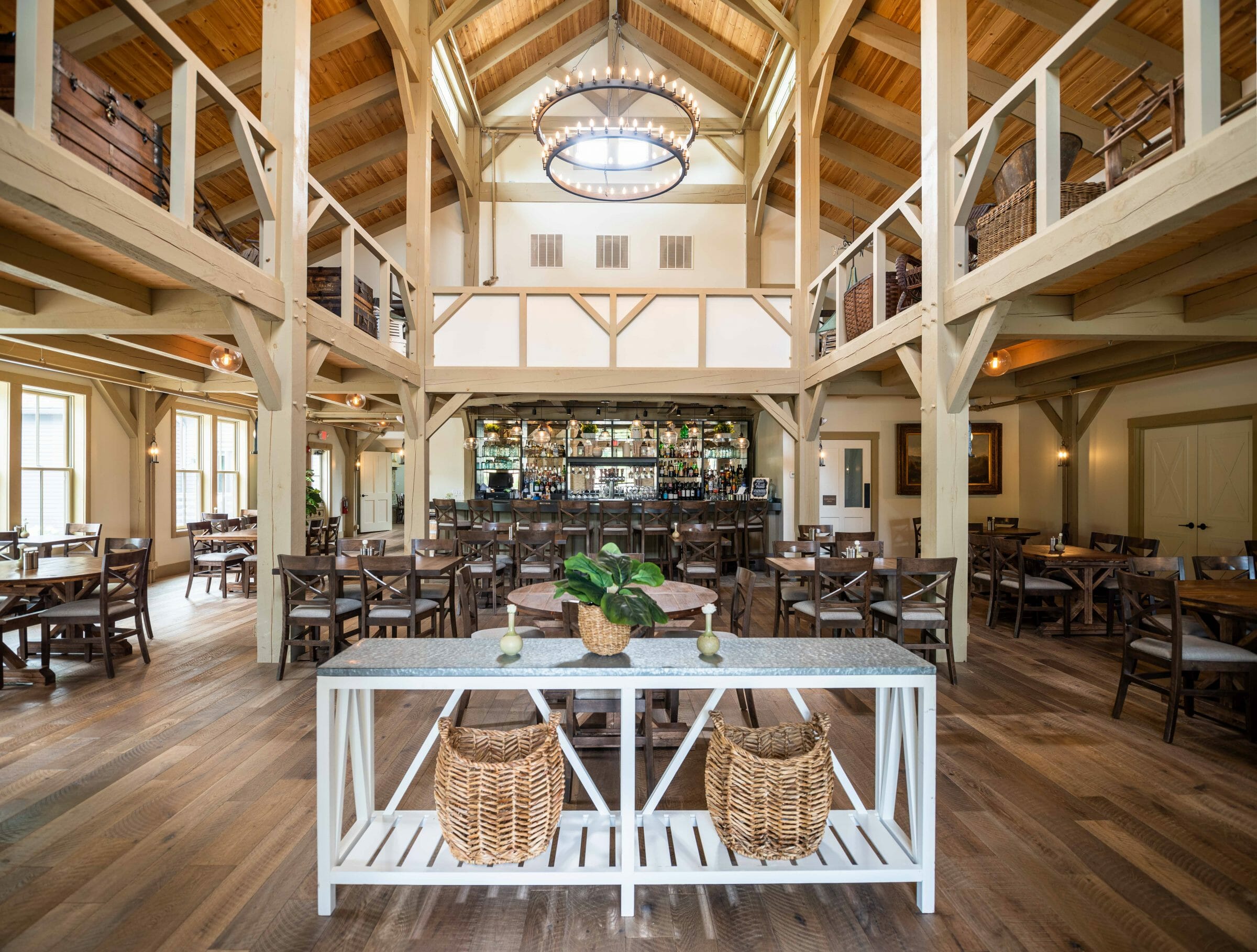 Interior of the Briar Barn Inn in Rowley, MA. The Monitor style barn features rough sawn Hemlock posts, beams, and trusses.