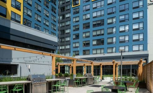 The Hamilton Pergola in Philadelphia, PA features a White Oak Pergola with Aluminum capping.