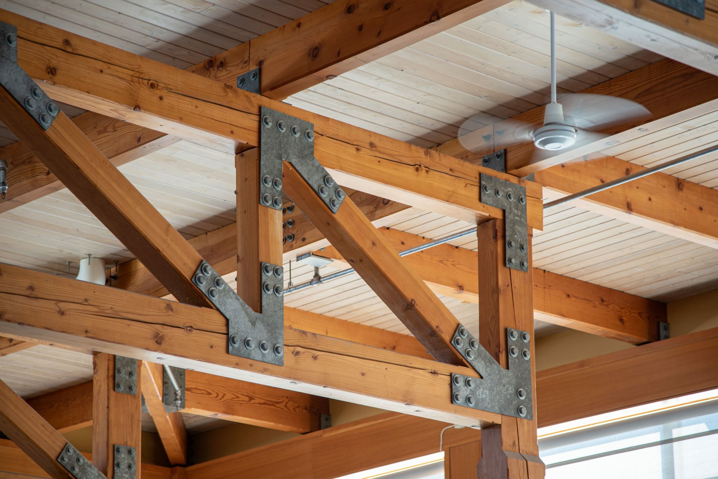 The Concord Christian Academy (previously the Centennial Senior Center) features cathedral ceilings and timber girder trusses.