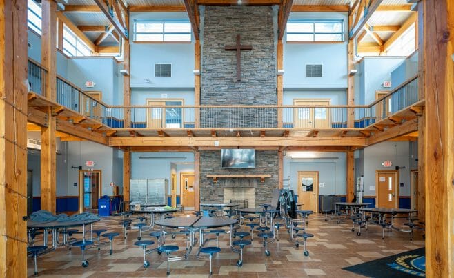 The Concord Christian Academy (previously the Centennial Senior Center) features cathedral ceilings and timber girder trusses.