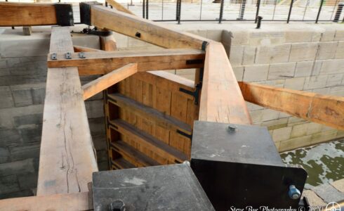 Timber balance beams on the lock gate