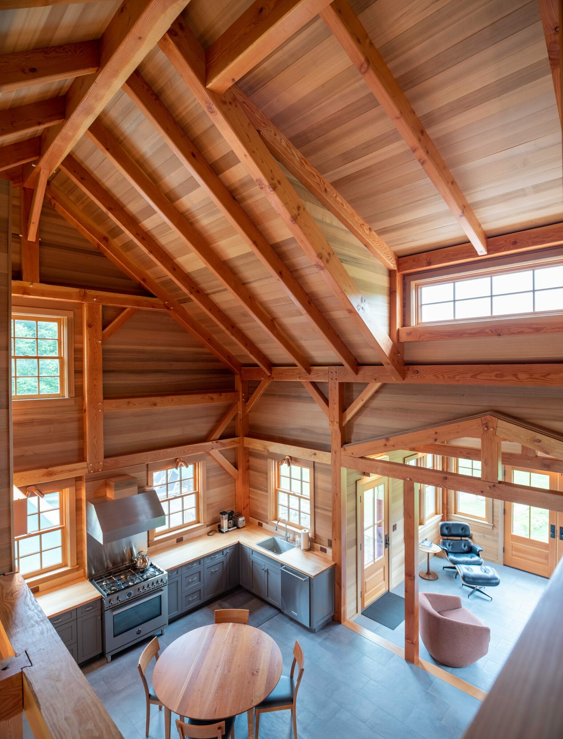 Interior of the Guest House on Martha's Vineyard Beach House that features Timber Posts and Beams, and Cedar cladding