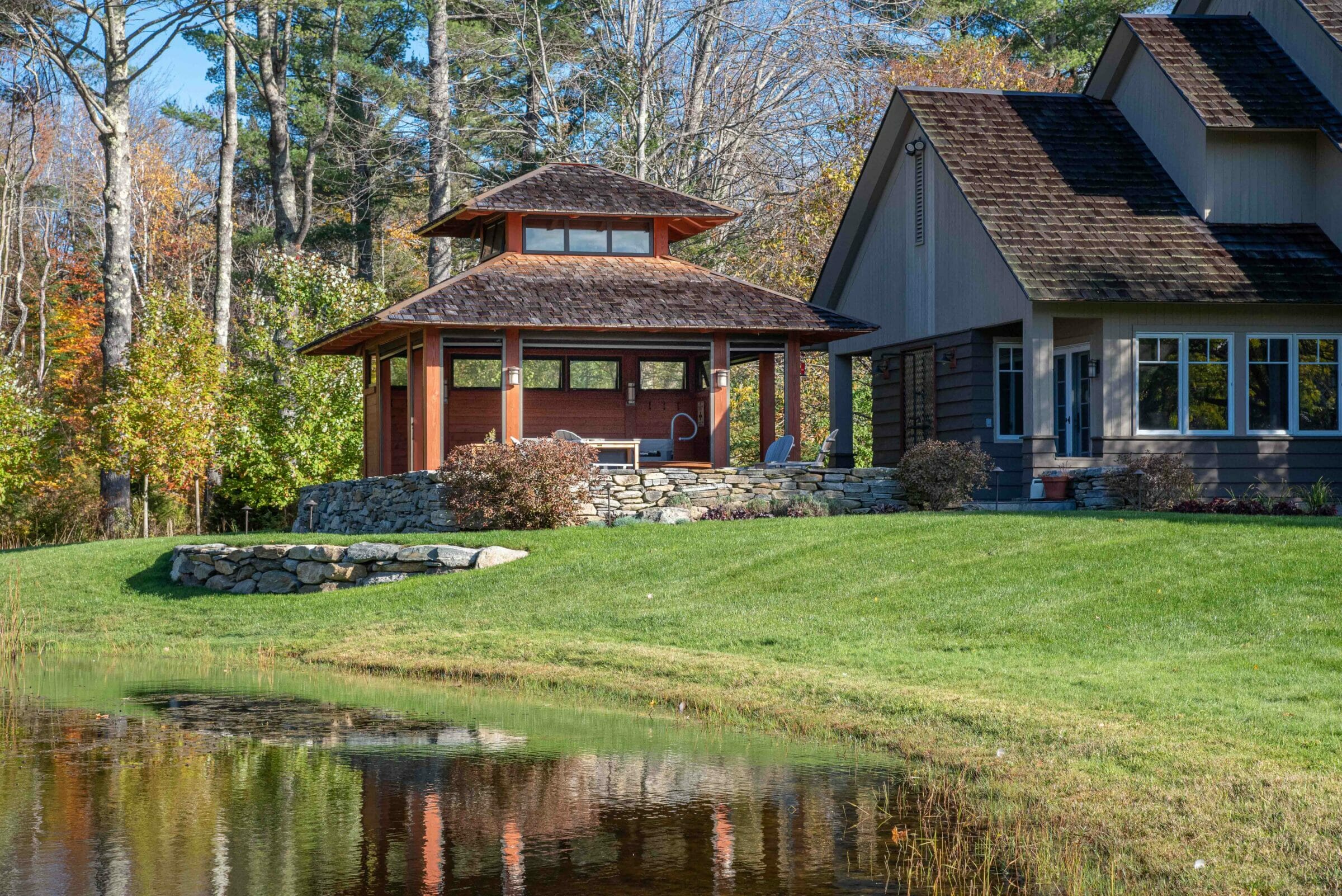 Timber Frame Hot Tub Pavilion overlooking the pond