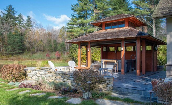 Timber Framed Hot Tub Pavilion overlooking the pond