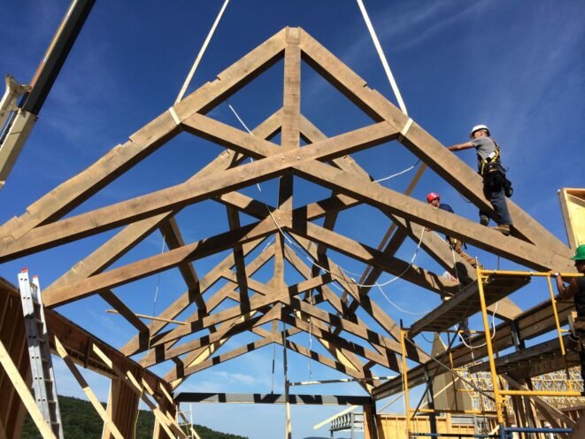 Scissor trusses being erected