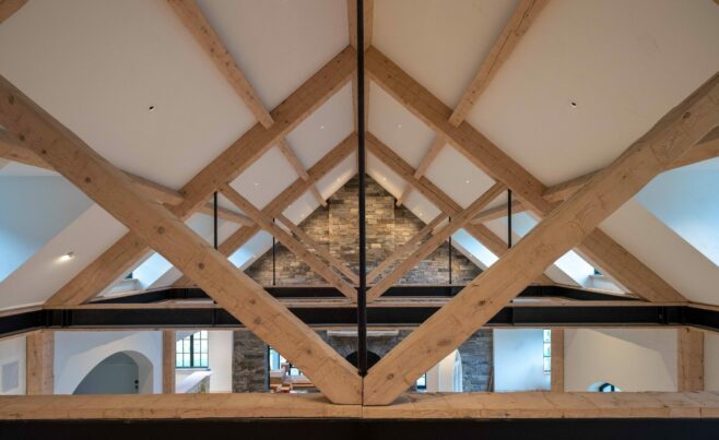 Hand Hewn Heavy Timber Trusses in a New Hampshire home.