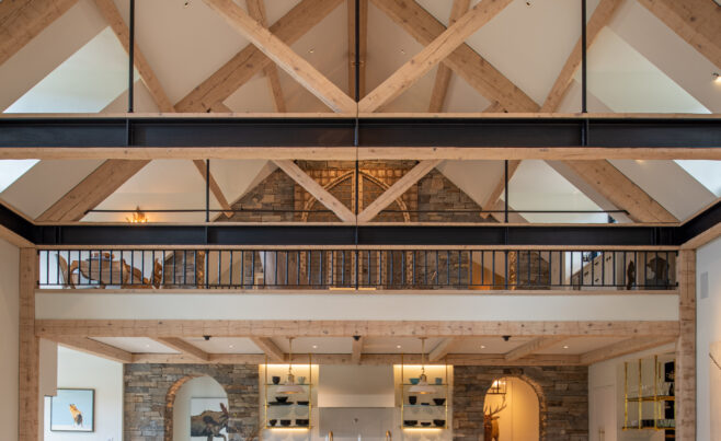 Timber frame with steel beams and steel rods
