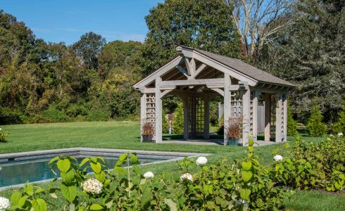 Custom Cedar Pavilion next to a swimming pool