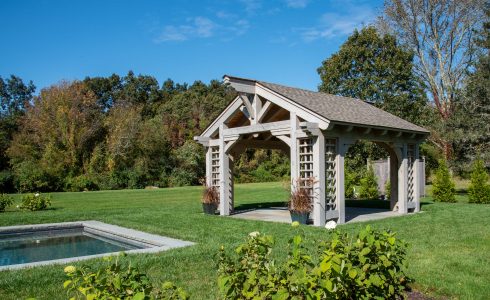Pavilion by a Swimming Pool with trellises and flowers boxes
