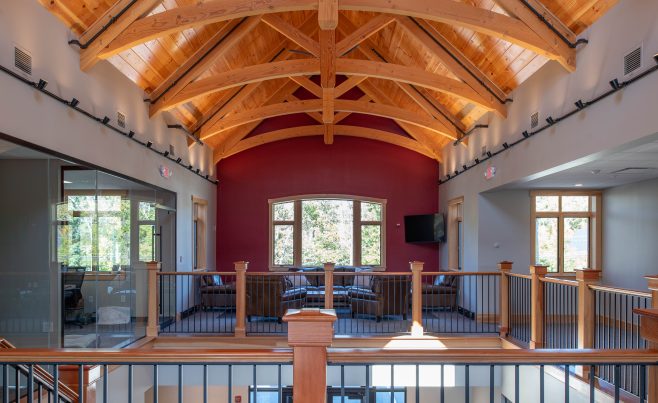 Heavy Timber Trusses with Up-lighting on the Ceiling
