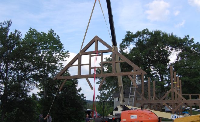 Post and Beam Bank Barn being installed with a crane