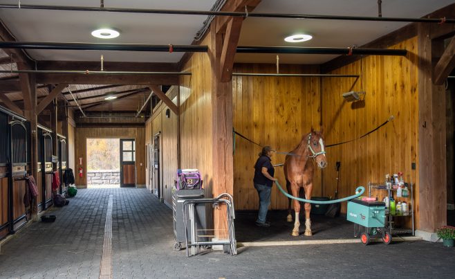 The wash stall in a post and beam horse barn.