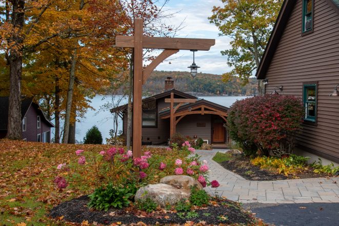 Lake House Walkway with Timber Lamp Posts & Curved Timber Truss Entryway