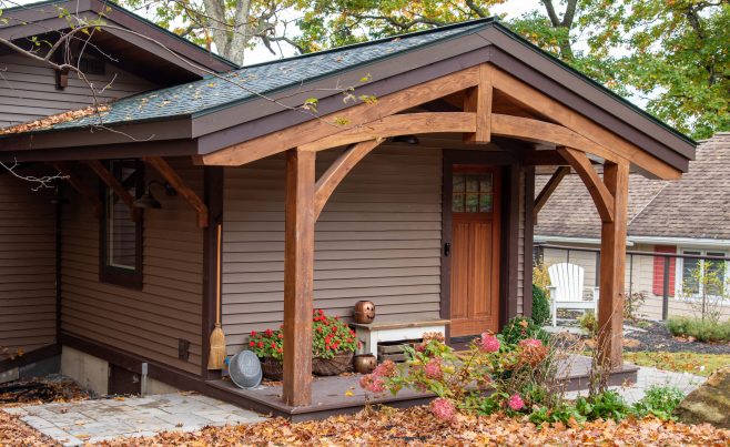 Vermont Lake House with a Curved timber Truss Entryway