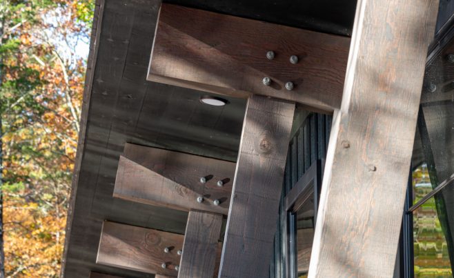 Detail photo of exterior timber beams and posts in New York