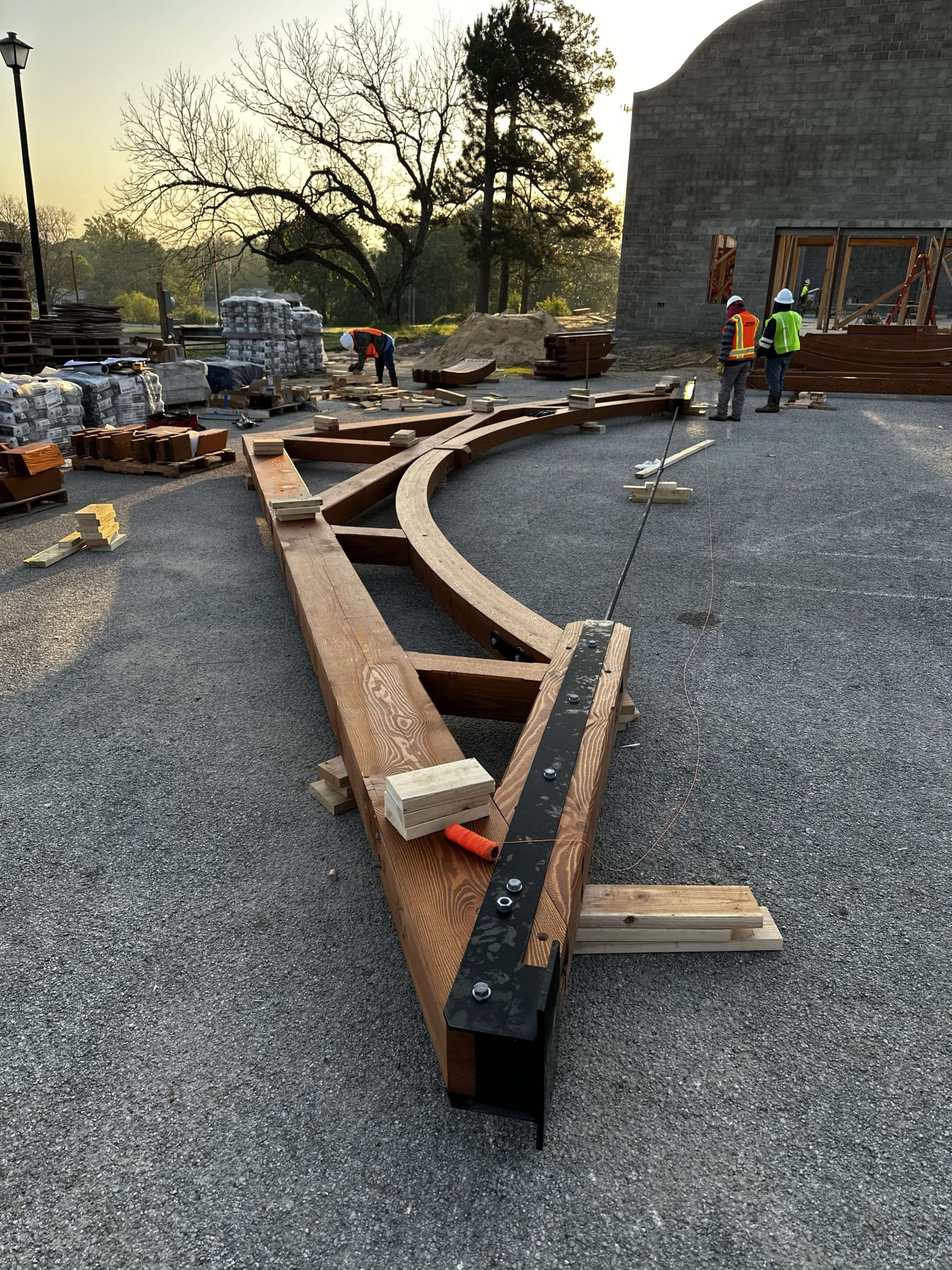 Heavy Timber Church Truss being assembled on the ground and prepared for lifting into place by by a crane