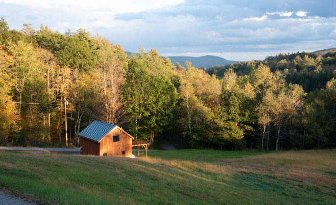 Vermont guest cottage in a post and beam style with a view of the VT Mountains