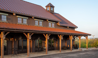 Traditionally timber framed porch on a barn