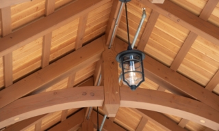 Arched timber beams in a building entryway